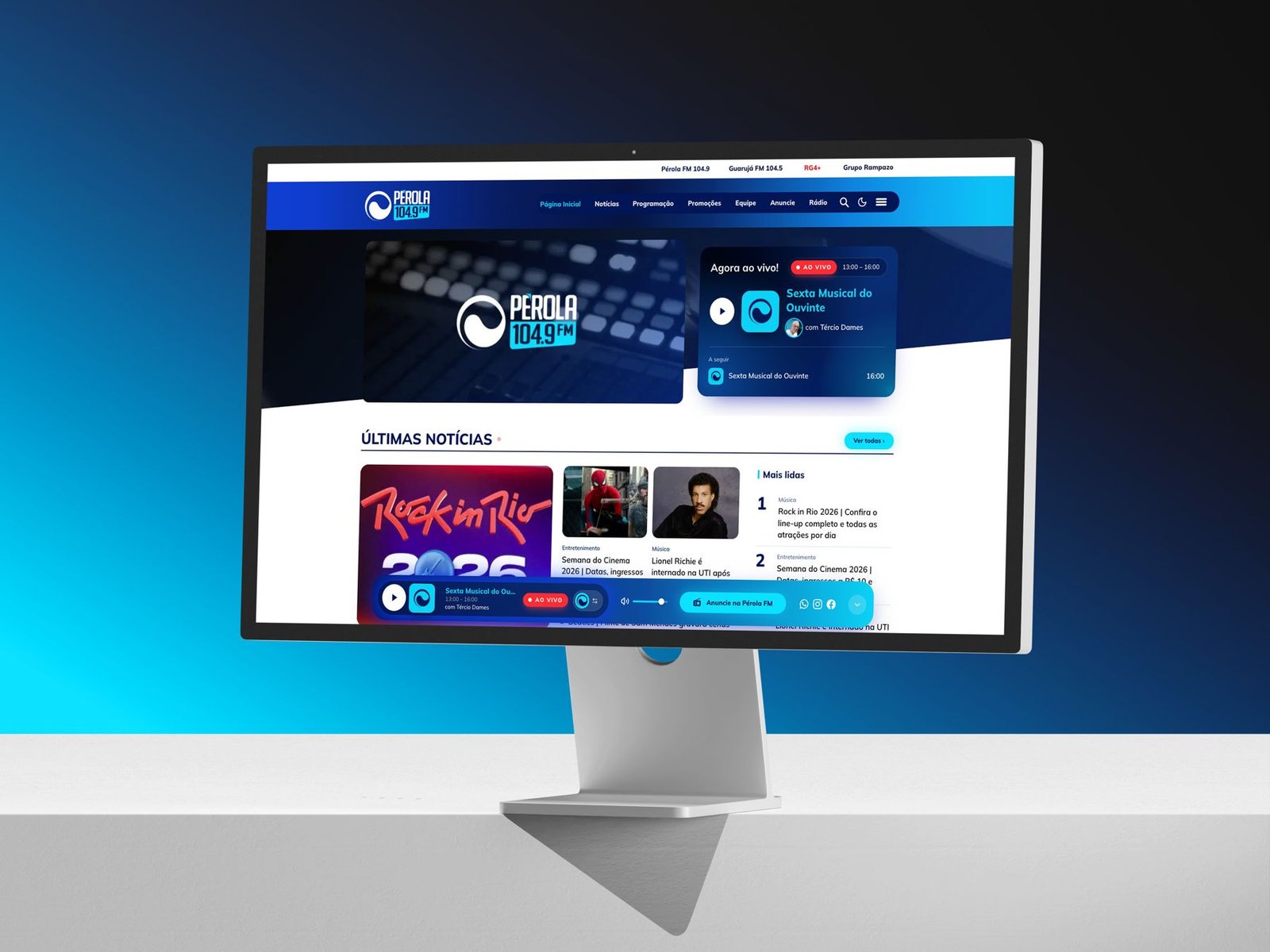 Site Pérola FM 104,9 em um monitor